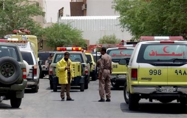 Saudi policmen are seen at the site of a shootout with militants in Riyadh, Saudi Arabia, Thursday, Aug.18, 2005.