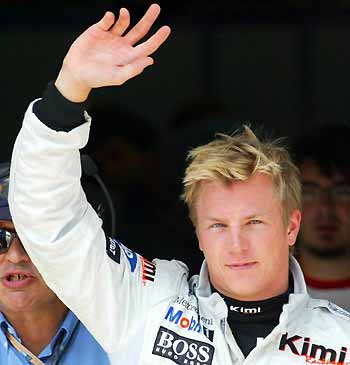 McLaren Formula One driver Kimi Raikkonen of Finland waves after clocking the fastest time during qualifying for the Turkish Grand Prix at Istanbul Park race track, August 20, 2005. McLaren's title challenger Raikkonen took pole position for Sunday's first Turkish Grand Prix and swept Renault's championship leader Fernando Alonso off the front row. [Reuters]