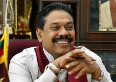 Sri Lankan Prime Minister and presidential candidate of the ruling coalition government Mahinda Rajapakse smiles during an interview with The Associated Press in Colombo, Sri Lanka, Monday, Aug. 29, 2005.