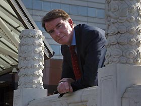 European trade chief Peter Mandelson looks on after a news conference outside a hotel in Beijing September 4, 2005. Mandelson said on Sunday he hoped a deal can be struck to unblock millions of Chinese garments stuck in EU ports before a bilateral summit on Monday. 