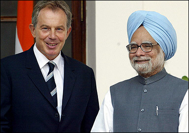 Britain's Prime Minister and President of the EU Council Tony Blair(L) poses with India's Prime Minister Manmohan Singh before a meeting in New Delhi.