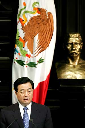 President Hu Jintao speaks during his visit to the Senate building in Mexico City, September 12, 2005. Hu is on a two day state visit to Mexico. 