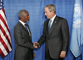 .S. President George W. Bush (R) is welcomed by United Nations Secretary General Kofi Annan (L) at U.N. headquarters in New York September 13, 2005.