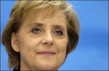 Angela Merkel, head of the Christian Democrats party (CDU) smiles during a press conference at her party's headquarters in Berlin. 