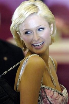 Paris Hilton arrives to promote her new perfume called 'Paris Hilton' in a mall in Sao Paulo, Brazil, on Thursday, Sept. 15, 2005. Hilton, the celebutante-turned-model broke off the wedding plans with Paris Latsis, according to a report posted Friday on Us Weekly's Web site, which quoted a statement it said Hilton released to the magazine.