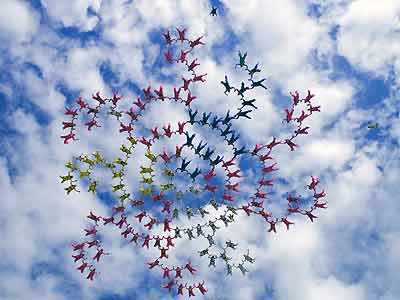 151 sky divers from eight Jump Planes set a World Record for formation skydiving in Perris, California with a "151-way" jump on September 30, 2005. The Record jump by the women of "Jump for the Cause" set occurred on 18th jump of the week. The group's previous record was a "131-way" in 2002. Jump for the Cause, the leading non-profit organization that organizes skydiving fundraisers, held the event at The Perris Valley Skydiving Center, the largest center in North America in Perris, California from September 26 - October 1, 2005, to kick off Breast Cancer Awareness Month. Participants for the event included two breast cancer survivors, and other cancer survivors. These women represented 24 states, 15 countries, and occupations that range from trauma nurses to airline pilots to safety engineers. They jump because in the time it takes to skydive from leap to landing; at least one woman will be diagnosed with breast cancer. [Reuters]