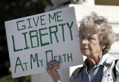 Ruth Gallaid from Eugene, Or., who supports physician assisted suicide, protests in front of the Supreme Court Wednesday, Oct. 5, 2005, in Washington.