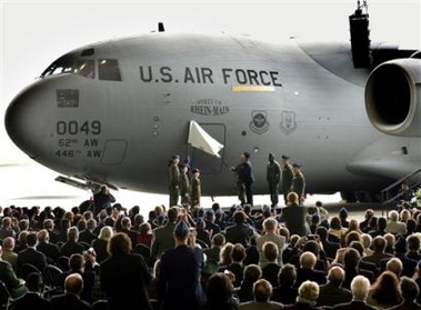 A C17 Globemaster aircraft named 'Spirit of Rhein-Main' is unveiled as part of the symbolic closing ceremony honoring US Rhein-Main Airbase in Frankfurt, central Germany, Monday, Oct. 10, 2005.