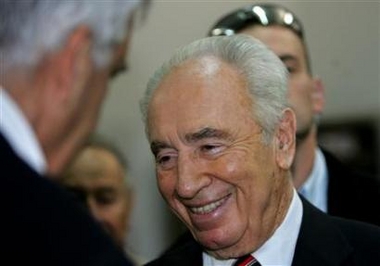 Israeli Deputy Prime Minister and Vice Premier Shimon Peres arrives at a polling place in Tel Aviv, November 9, 2005.