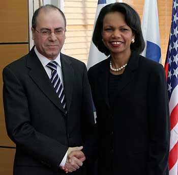 Israeli Foreign Minister Silvan Shalom (L) shakes hands with U.S. Secretary of State Condoleezza Rice during a meeting in Jerusalem November 14, 2005. Rice meets Israeli and Palestinian leaders on Monday in a bid to revive the peace process that has been stalled by violence.