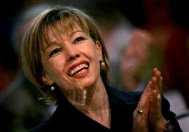 Doris Schroeder-Koepf, wife of Germany's outgoing Chancellor Gerhard Schroeder, reacts to the speech of the Social Democratic Party's newly elected chairman Matthias Platzeck during the second day of Germany's SPD party convention in the southern German town of Karlsruhe, November 15, 2005.