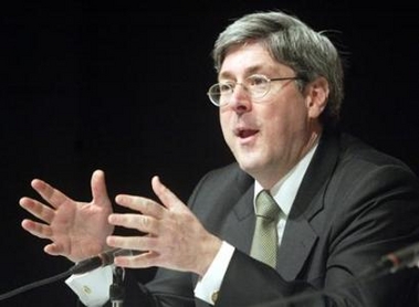 Douglas Feith speaks during a news conference at the American center in Islamabad, February 3, 2005.