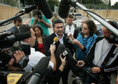 Israel's newly elected Labor Party leader Amir Peretz speaks to the media after a meeting with Israeli Prime Minister Ariel Sharon in Tel Aviv, Israel, Thursday Nov. 17, 2005. 