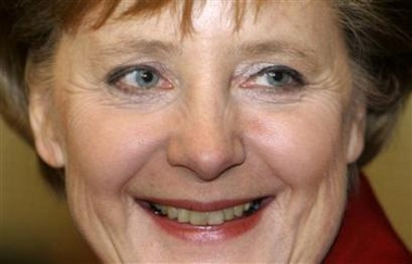 Christian Democrat (CDU) leader and German Chancellor-designate Angela Merkel smiles before a meeting of the CDU/CSU parliamentary group in Berlin November 21, 2005.