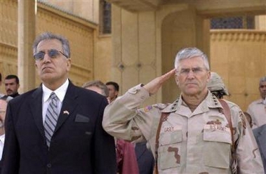 U.S. Ambassador to Iraq Zalmay Khalilzad, left, and U.S. commander in Iraq, Gen. George Casey, attend the hand over ceremony of a presidential palace in Tikrit, Iraq, Tuesday, Nov. 22, 2005.