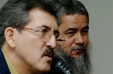 National Liberation Army, ELN, representatives, Antonio Garcia, left, and Francisco Galan speak to the media during a press conference in Havana,Cuba, Wednesday,Dec.21, 2005. 