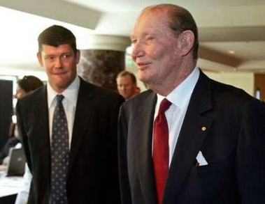 Australia's richest man Kerry Packer (R) is followed by his son James (L), executive chairman of Publishing and Broadcasting Limited (PBL), as he walks to the company's annual general meeting in Sydney in this October 27, 2005 file photo.
