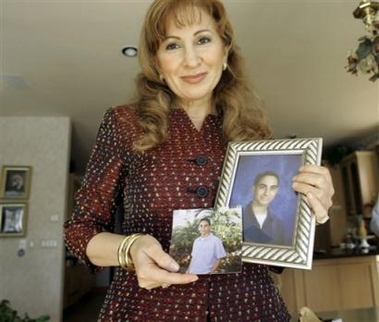 Shatha Atiya displays photos, of her 16-year-old son, Farris Hassan, who traveled to Iraq during the Christmas holidays, in her Fort Lauderdale, Fla. home Friday, Dec. 30, 2005.