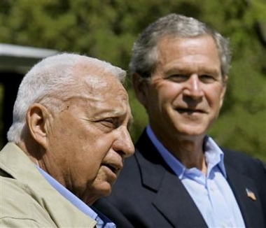 U.S. President George W. Bush listens as Israeli Prime Minister Ariel Sharon, left, reads a statement at a joint news conference following their talks about the Middle East peace process at Bush's ranch in Crawford, Texas, in this April 11, 2005 file photo.