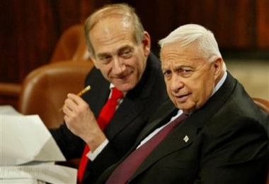 Israeli Prime Minister Ariel Sharon, right, and Vice-Premier Ehud Olmert attend a session in the Knesset, Israel's parliament, in this Wednesday Feb. 23, 2005 file photo.