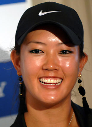 Michelle Wie of the U.S. attends a news conference after being eliminated from the Sony Open golf tournament at the Waialae Country Club on the island of Oahu in Honolulu, Hawaii January 13, 2006. [Reuters]