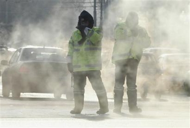 Traffic police officers braving freezing temperature control traffic in downtown Moscow, Wednesday, Jan. 18, 2006.