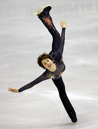 Irina Slutskaya of Russia performs during the Ladies short program of the European Figure Skating Championships in Lyon, central France January 18, 2006. [Reuters] 