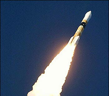 A Japanese H-2A rocket flies into orbit just after lifting off from the national space center on Tanegashima, in 2002.
