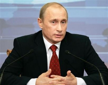 Russian President Vladimir Putin answers journalists' questions during his annual news conference in Moscow, January 31, 2006