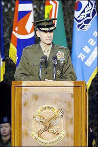 General Peter Pace, chairman of the US Joint chiefs of staff, speaks during a change of command ceremony at Collier Field House, a US military base, in Seoul. Pace said that the risk of war with China was diminishing with the growth of economic ties between the emerging superpower and the United States.(AFP
