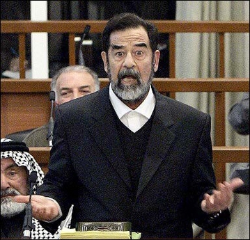 Former Iraqi president Saddam Hussein argues with new chief judge, Rauf Rashid Abdel Rahman, held in Baghdad's heavily fortified Green Zone, on January 29.