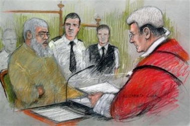 This is an artist impression of radical Muslim cleric Abu Hamza, left, being addressed by Judge Anthony Hughes,right, in the dock at the Old Bailey, London, Tuesday, Feb. 7, 2006.