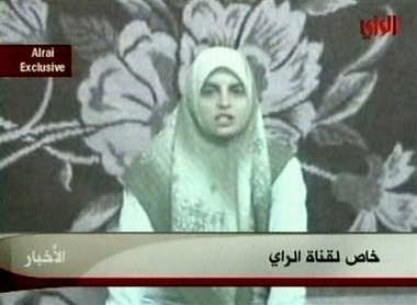 This is an image from TV showing kidnapped U.S. journalist Jill Carroll, appearing on a video aired in Kuwait Thursday, Feb. 9 2006, asking people to do whatever her Iraqi kidnappers want to get her released. 