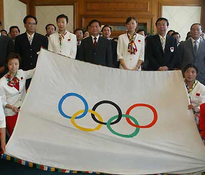 Chinese athletes return home