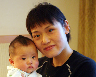 NPC deputy Xu Hongyan and her 3-month baby