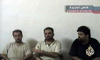 Al Jazeera shows tape of Italian hostages in Iraq 