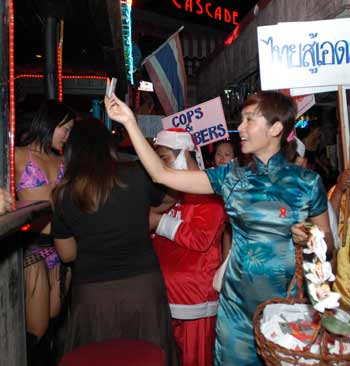 Chinese stars hand out free condoms in Thai red light area