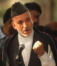 Afghan president drops warlord from ticket