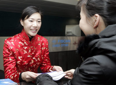 Serving Taiwan passengers in traditional attire