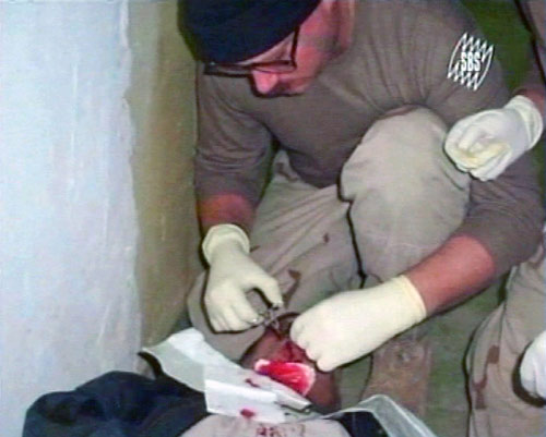 New photos of Abu Ghraib abuse surface