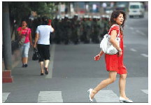 Tension remains in Urumqi after riots killed 156