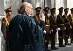 Afghan leader Karzai vows inclusive government