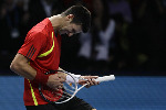 Davydenko pips Djokovic to semi-final spot