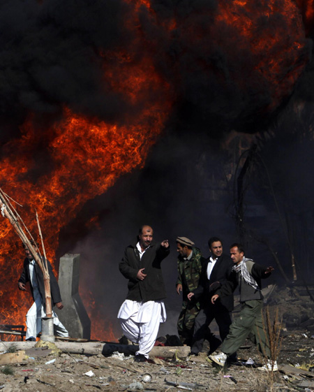 Afghan official: 8 killed in suicide bombing