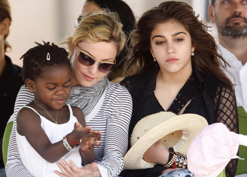 Madonna and her adopted child at site of her Raising Malawi Girls Academy