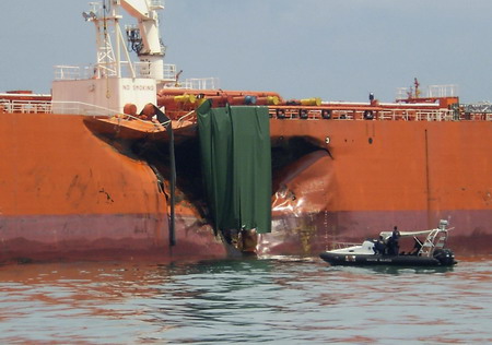 Oil spills off Singapore after tanker collision