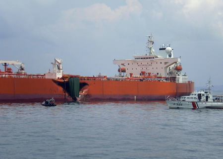 Oil spills off Singapore after tanker collision