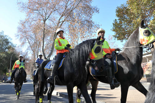 South African police patrol for stadium security