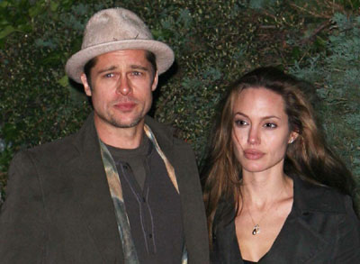 Angelina Jolie and Brad Pitt leaving a restaurant