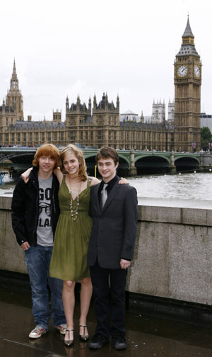 Cast members pose for 